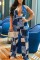 Blue Sexy Casual Print Bandage Hollowed Out Backless Halter Skinny Jumpsuits