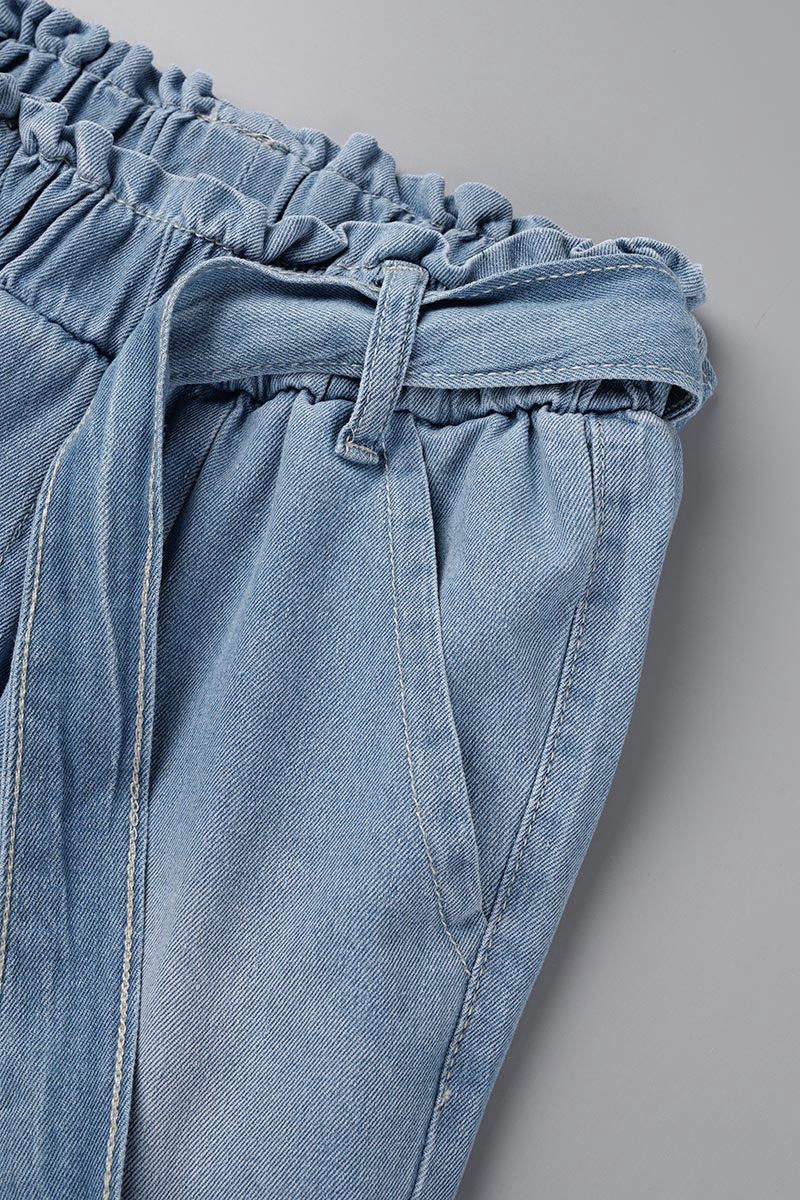 Blue Washed High Waisted Denim Jeans With A Front Patch Pocket And Chain Detailing