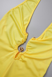 Yellow Sexy Solid Backless Halter Skinny Romper