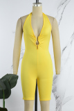 Yellow Sexy Solid Backless Halter Skinny Romper