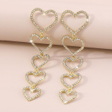 White Heart Pattern Hollow Out Rhinestone Decor Tassel Earrings