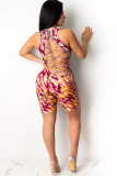 Grey Sexy Hollow Asymmetrical Camouflage Backless Print Chemical fiber blend Sleeveless O Neck Rompers