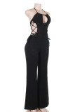 Sexy Solid Color Hollow Out Strap Design Halter Skinny Jumpsuits