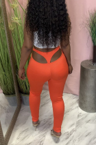 Orange Fashion Casual Solid Hollowed Out Regular High Waist Pencil Trousers