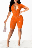 Orange Fashion Sexy Solid Ripped Hollowed Out Zipper Collar Skinny Romper