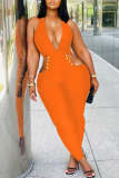 Tangerine Red Sexy Solid Hollowed Out Patchwork V Neck Regular Jumpsuits