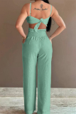 Light Yellow Sexy Solid Hollowed Out Pocket Flowers Regular Jumpsuits