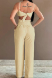 Light Yellow Sexy Solid Hollowed Out Pocket Flowers Regular Jumpsuits