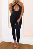 Casual Solid Color Hollow Out Patchwork Backless Halter Skinny Jumpsuits