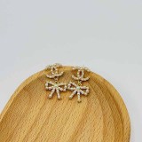 Elegant Letter Pearl With Bow Earrings