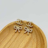 Elegant Letter Pearl With Bow Earrings