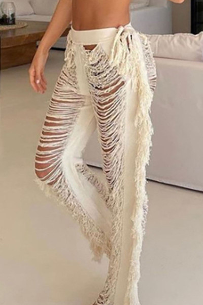 Sexy Solid Tassel Hollowed Out Patchwork Straight High Waist Straight Solid Color Bottoms