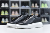 Alexander McQueen Sneaker Black Skin White Background 553680-WHGP5-1000