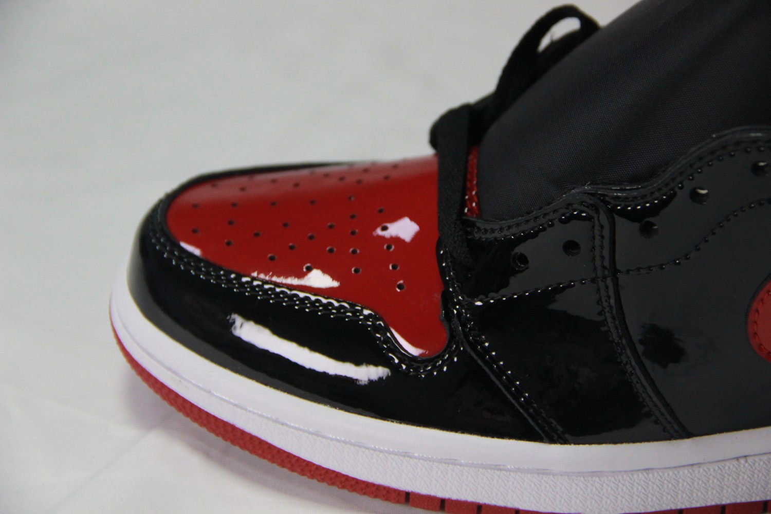 Jordan 1 Retro High OG Patent Bred 555088-063