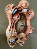 6 headed wall hanging clock