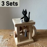 Cat Wanting to Drop a Cup